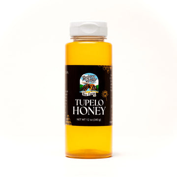 Raw tupelo honey unfiltered squeeze bottle, locally sourced Florida honey with rich flavor and easy-pour design