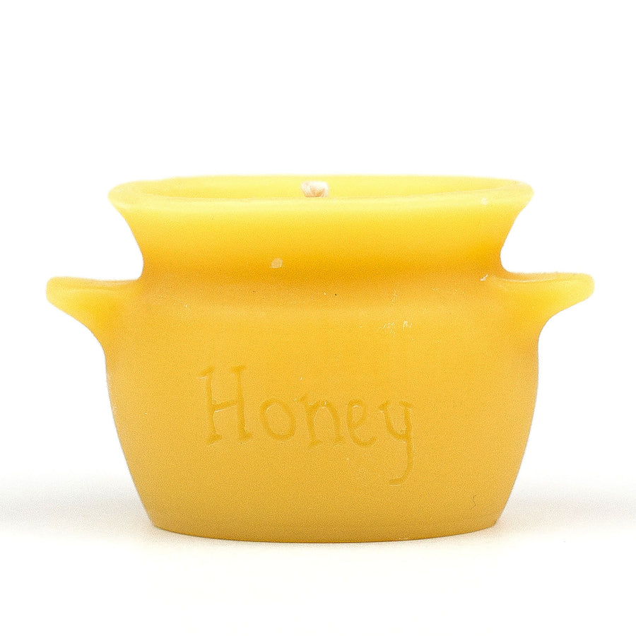 Honey pot-shaped beeswax candle.